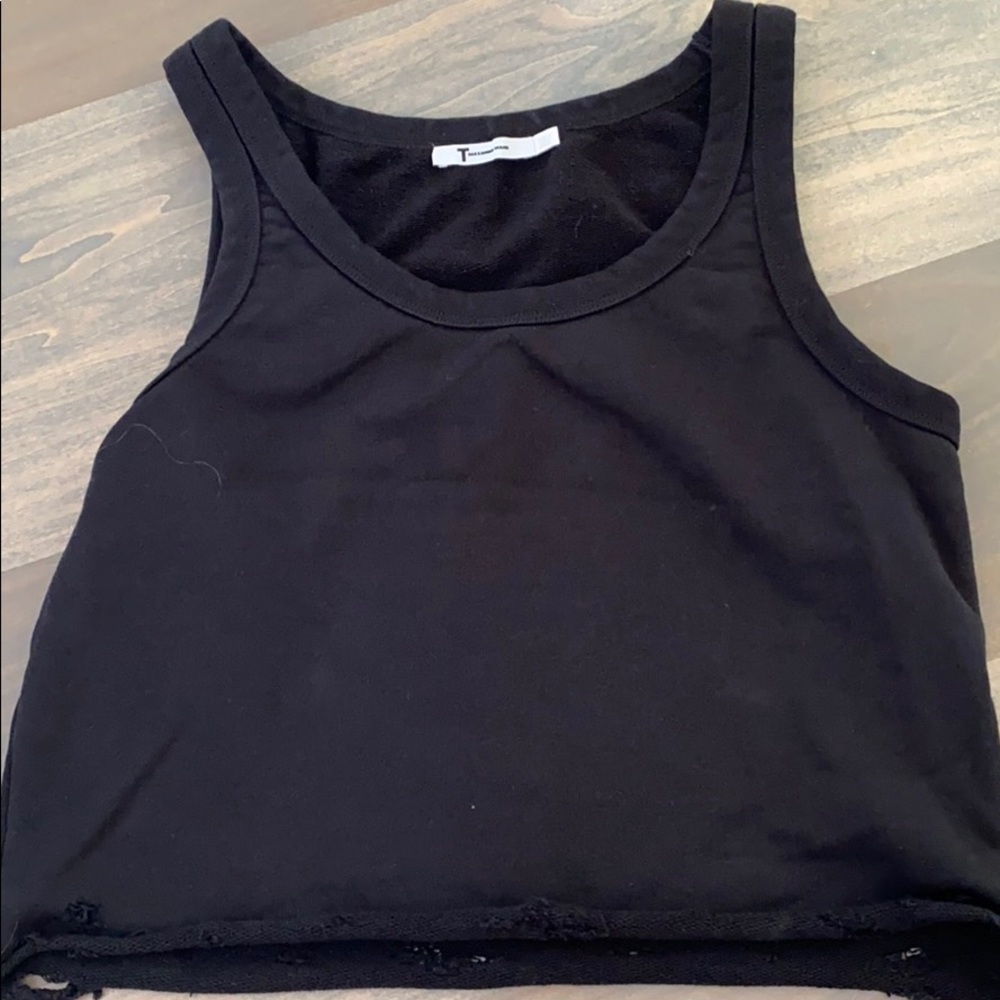 Tank top with ripped bottom